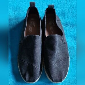 Tom's shoes. Dark grey color. Size 10.5 medium width. No wear on bottom tread.